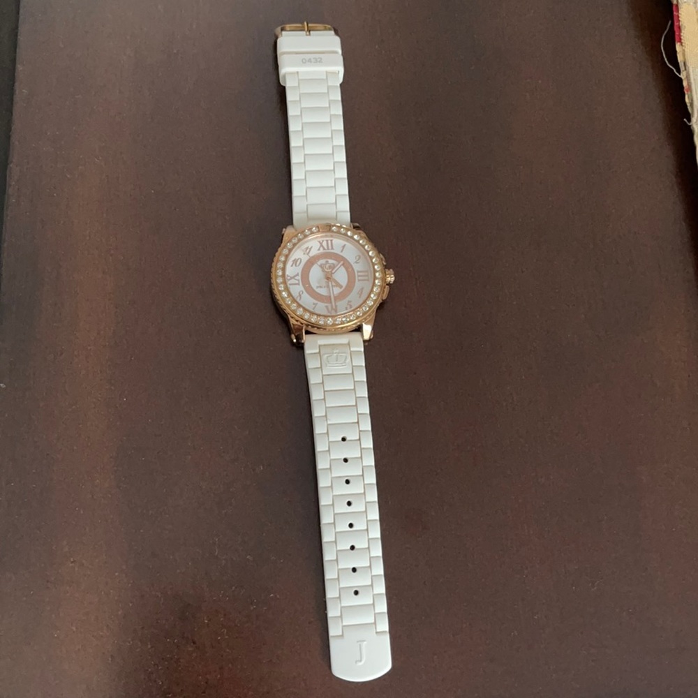 Rose gold Juicy Couture watch.